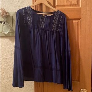 Navy blue peasant shirt. Never worn. Size large.